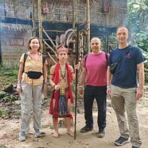 a group of people standing in front of a building