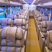 a bus with rows of seats on it