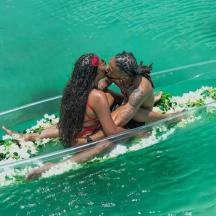 two women on a boat in the water
