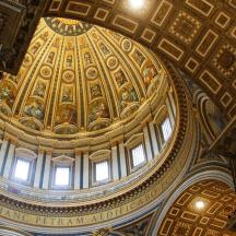 a ceiling of a building with a dome