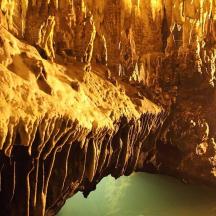 a cave with a body of water in it