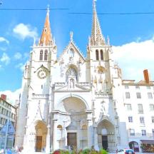 a large white church with a clock tower