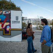 a man and a woman walking down a street