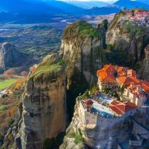 a monastery perched on the side of a mountain