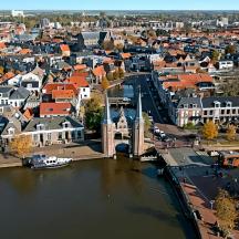 an aerial view of a city with a river