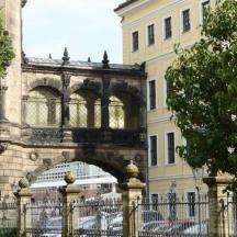 a building with a gate in front of a building