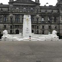 a large building with a statue in front of it