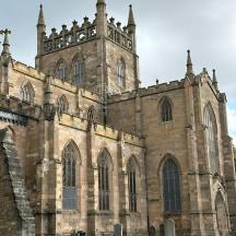 a large stone building with a tower on top