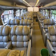 a bus with rows of seats on it