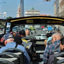 a group of people sitting on a bus