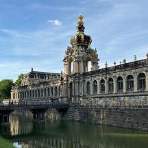 a building with a bridge over a river