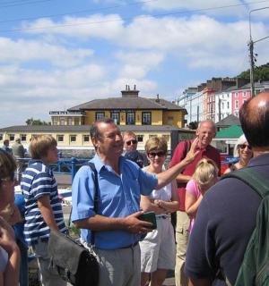 a group of people standing around in a crowd
