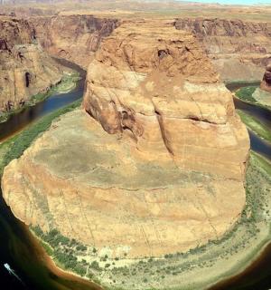 an aerial view of a river in a canyon