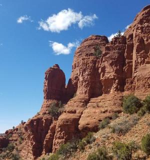 a view of a rocky mountain in the desert