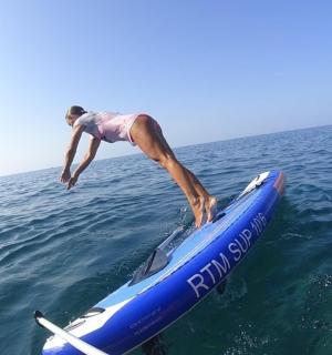a person on a surfboard in the water