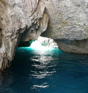 a large cave in the middle of the water