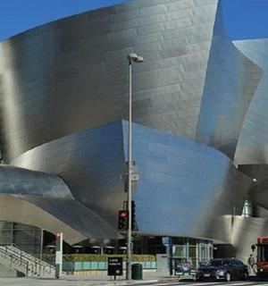 a bus is parked in front of a building