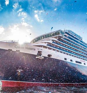 a cruise ship is docked in the water