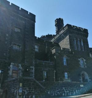 a large brick building with a tower on top