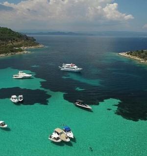 a group of boats in a large body of water