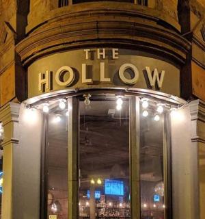 a building with a sign that reads the hollywood