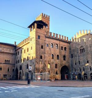 a large brick building with a tower on top of it