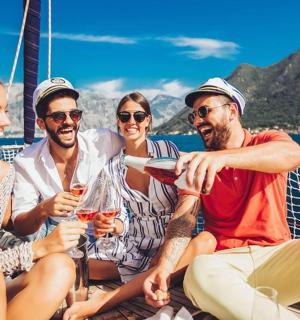 a group of people sitting on a boat
