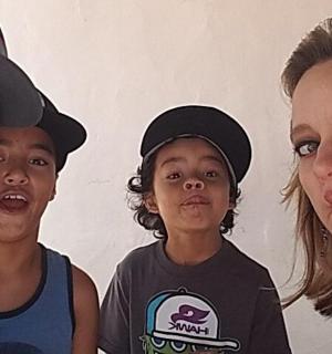 a group of young people sticking their tongue out