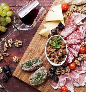 a table with a bunch of different types of food