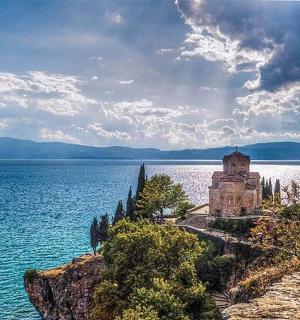 a building on the shore of a large body of water