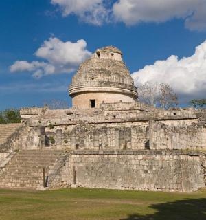 an old building with a tower on top of it