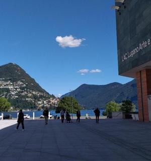 a group of people standing outside of a building