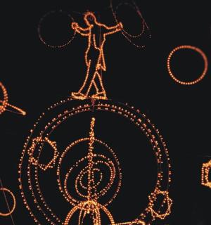 a christmas decoration of a man on a bike