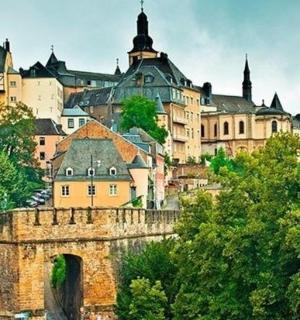 a view of a city with a bridge and buildings