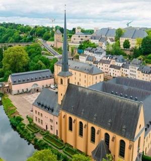 an aerial view of a town with a church