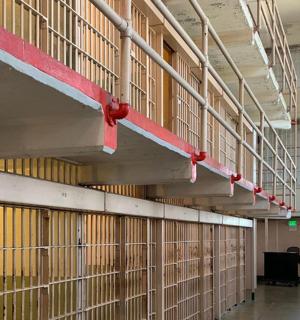 a row of cells in a large building