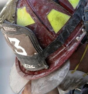 a man wearing a viking helmet on his head