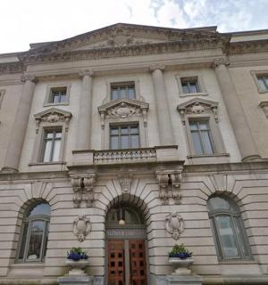 a large stone building with windows and a door