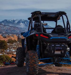 a atv parked on the side of a mountain