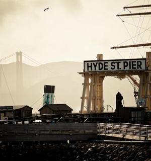 a dock with a ship with a sign that reads hype st pier