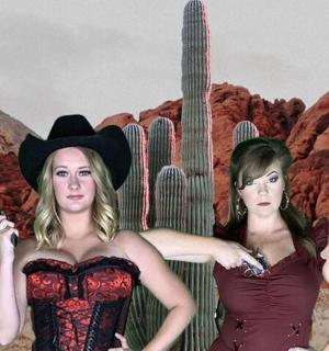 Dvě ženy stojí před kaktusem