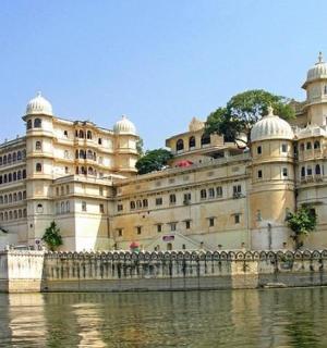 a large building next to a body of water