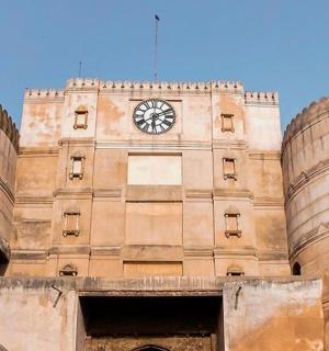a building with a clock on the side of it