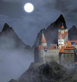 a castle on a mountain with the moon in the sky