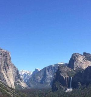a mountain with a waterfall in the middle of it