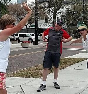 a group of men playing a game of frisbee