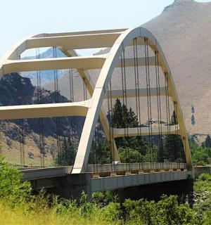 a bridge in the middle of a mountain