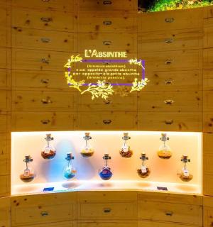 a display case with a bunch of acoustic guitars