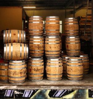 a bunch of barrels stacked on top of each other