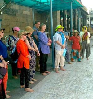 a group of people standing outside of a building